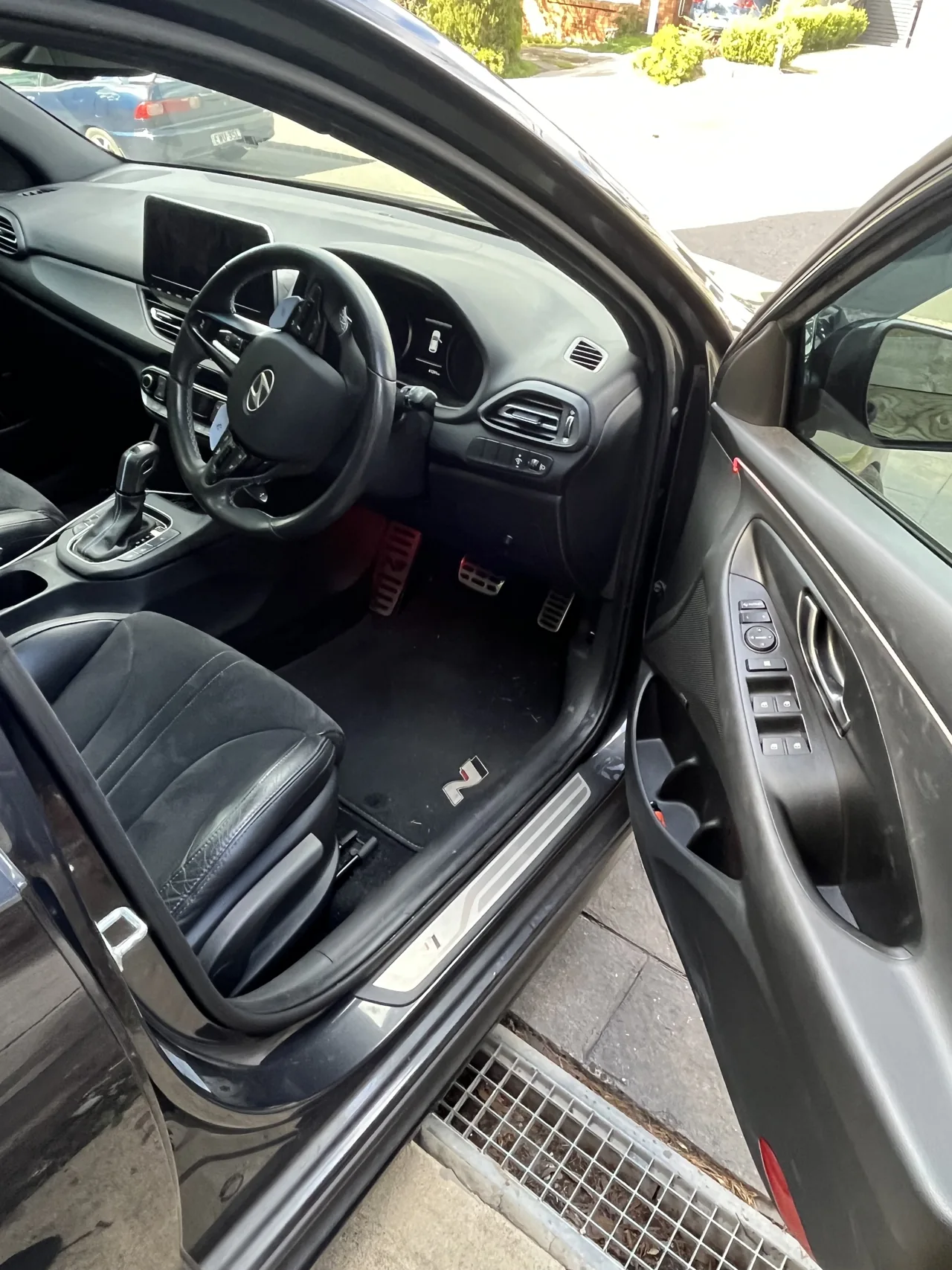 Clean leather seats and centre console from our detailing work